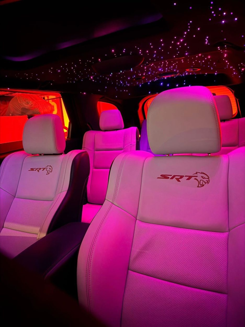 Second row of the Durango glowing pink under the stars